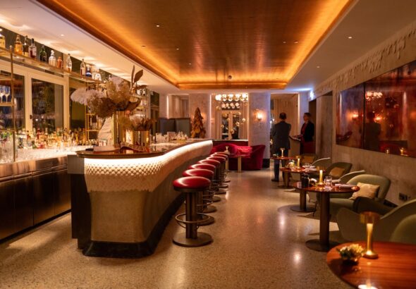 Luxury lounge bar interior with ambient lighting and modern furniture