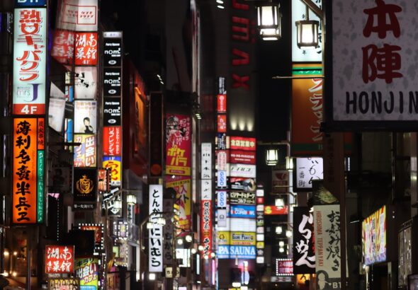 A Kabukicho street full of neon signs at night in Shinjuku