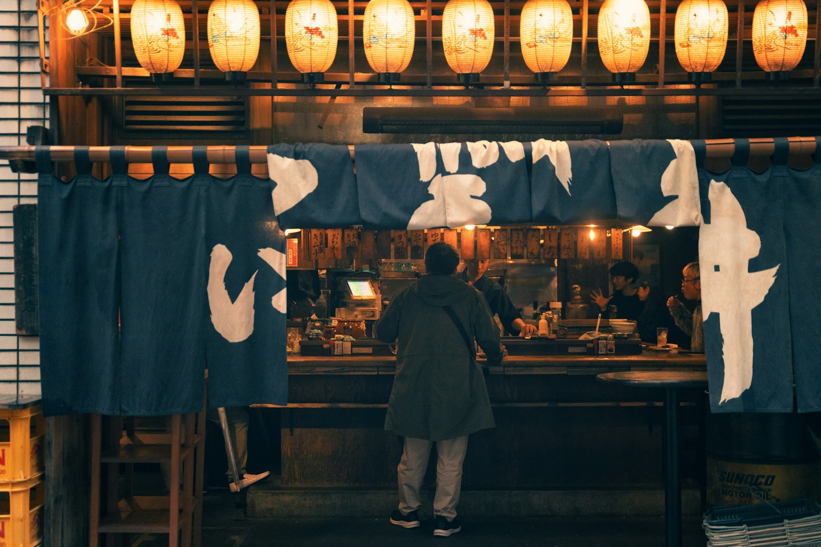 A counter-style Japanese bar — the layout that defines how the girls bar price system is structured