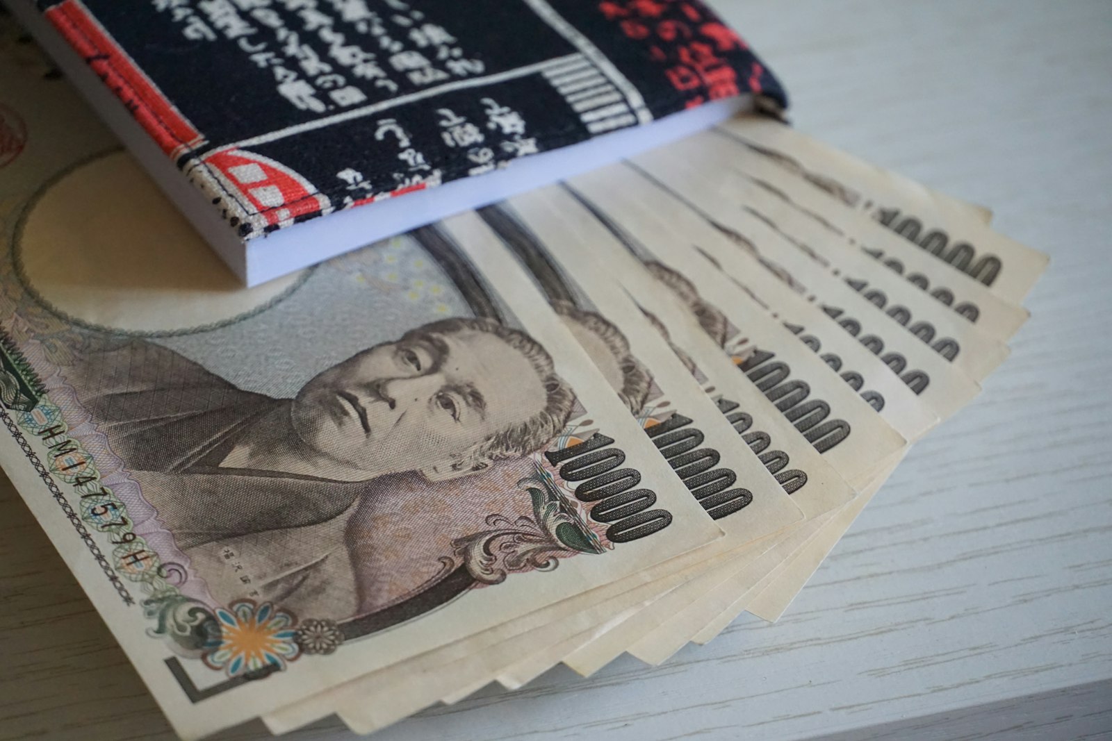 Japanese yen in cash — many girls bars still settle in cash, so confirm the total before you hand anything over