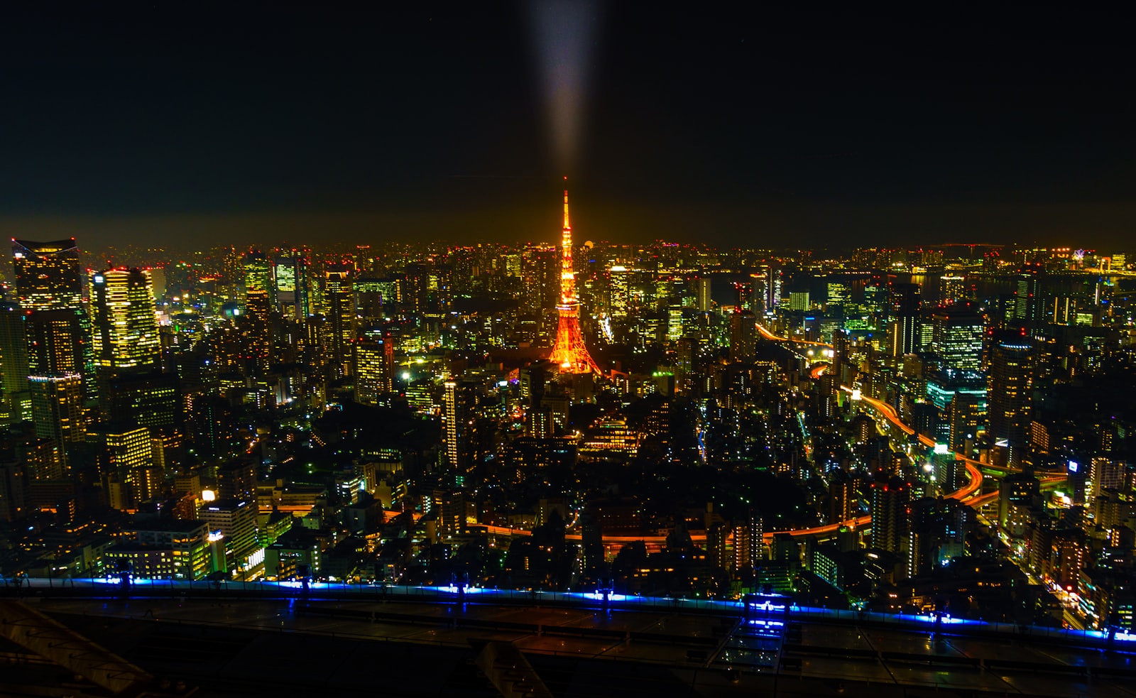 A champagne bottle on a dimly lit Tokyo bar counter, evoking the champagne call ritual at Kabukicho host clubs