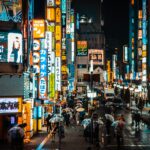 Neon-lit street in Kabukicho, Shinjuku, where tourists learn how to avoid scams in Tokyo's nightlife district