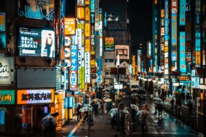 Neon-lit street in Kabukicho, Shinjuku, where tourists learn how to avoid scams in Tokyo's nightlife district