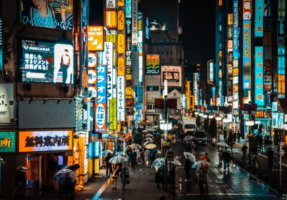 Neon-lit street in Kabukicho, Shinjuku, where tourists learn how to avoid scams in Tokyo's nightlife district