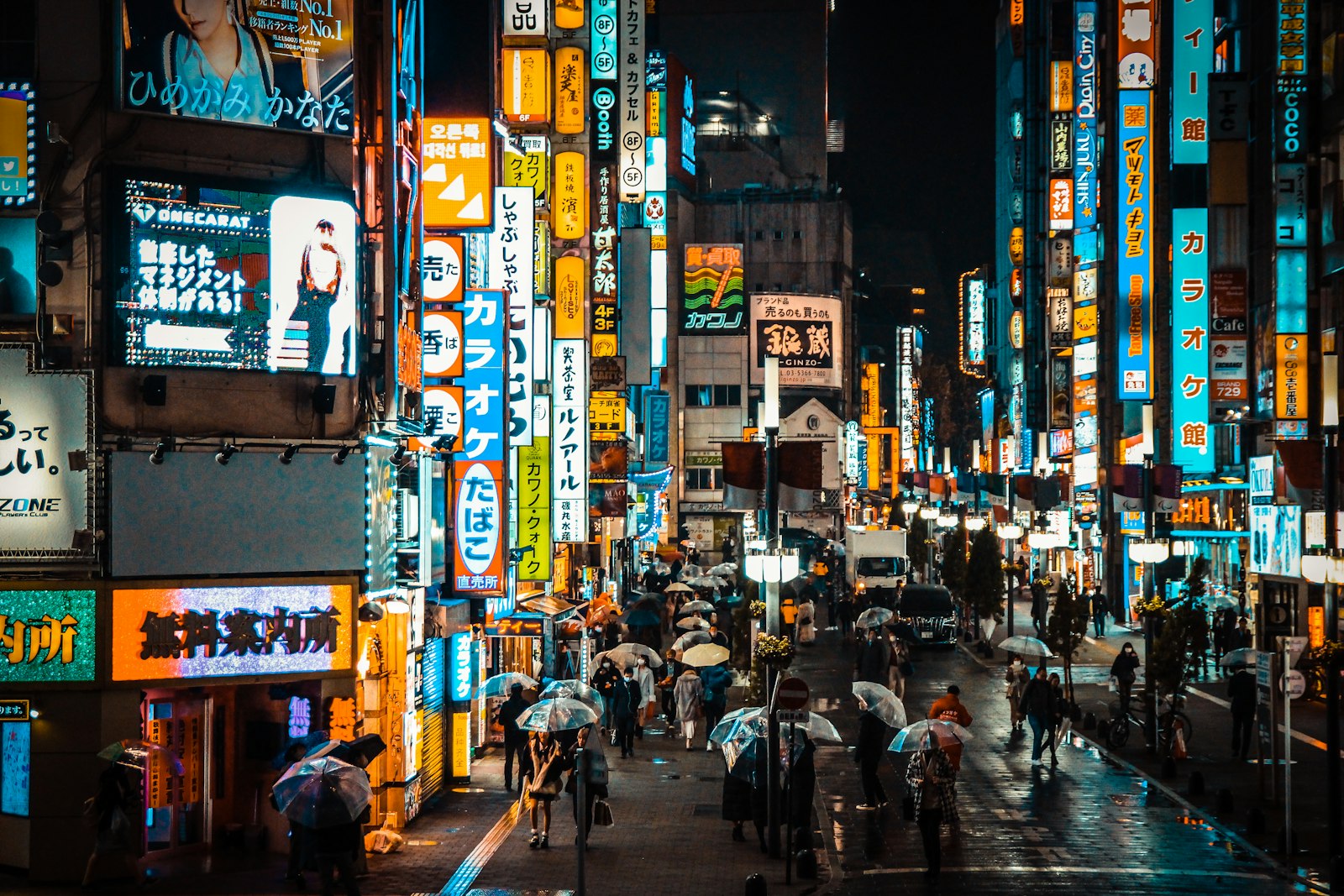 Neon-lit street in Kabukicho, Shinjuku, where tourists learn how to avoid scams in Tokyo's nightlife district