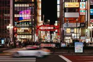 Neon-lit street in Kabukicho, Shinjuku, packed with bars and restaurants at night