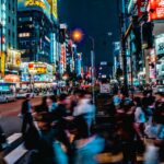 Crowded neon-lit street in Kabukicho, Shinjuku, at night — the area covered by this Kabukicho scams tourists warning