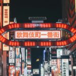 Neon-lit alley of tiny themed bars in Shinjuku Golden Gai, Tokyo