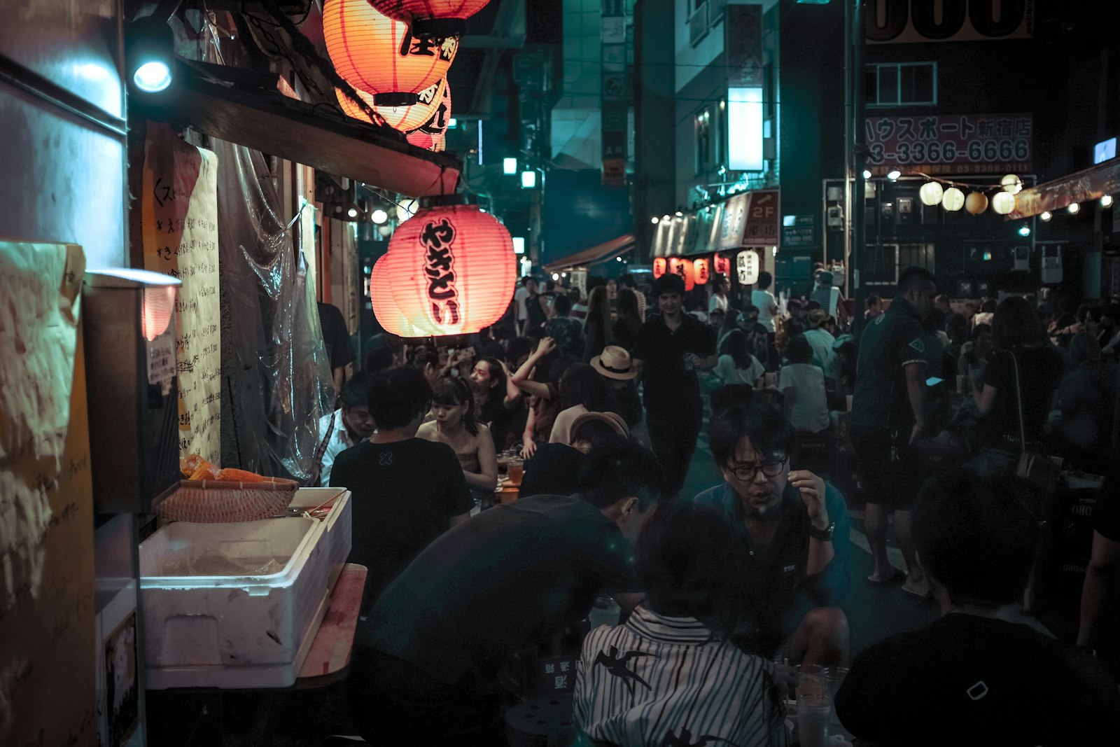 Quiet Koenji side street at night, where locals find a laid-back anime bar in Tokyo