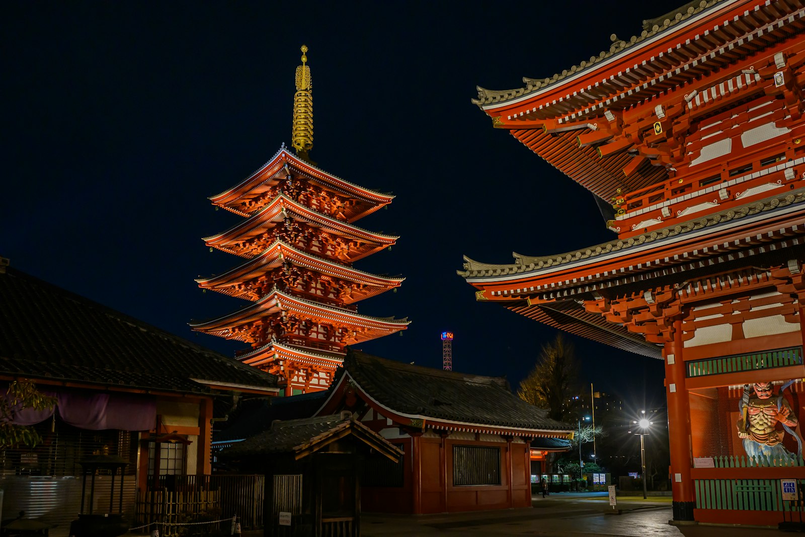 Senso-ji main hall and five-storied pagoda lit up at night, the highlight of an Asakusa night tour