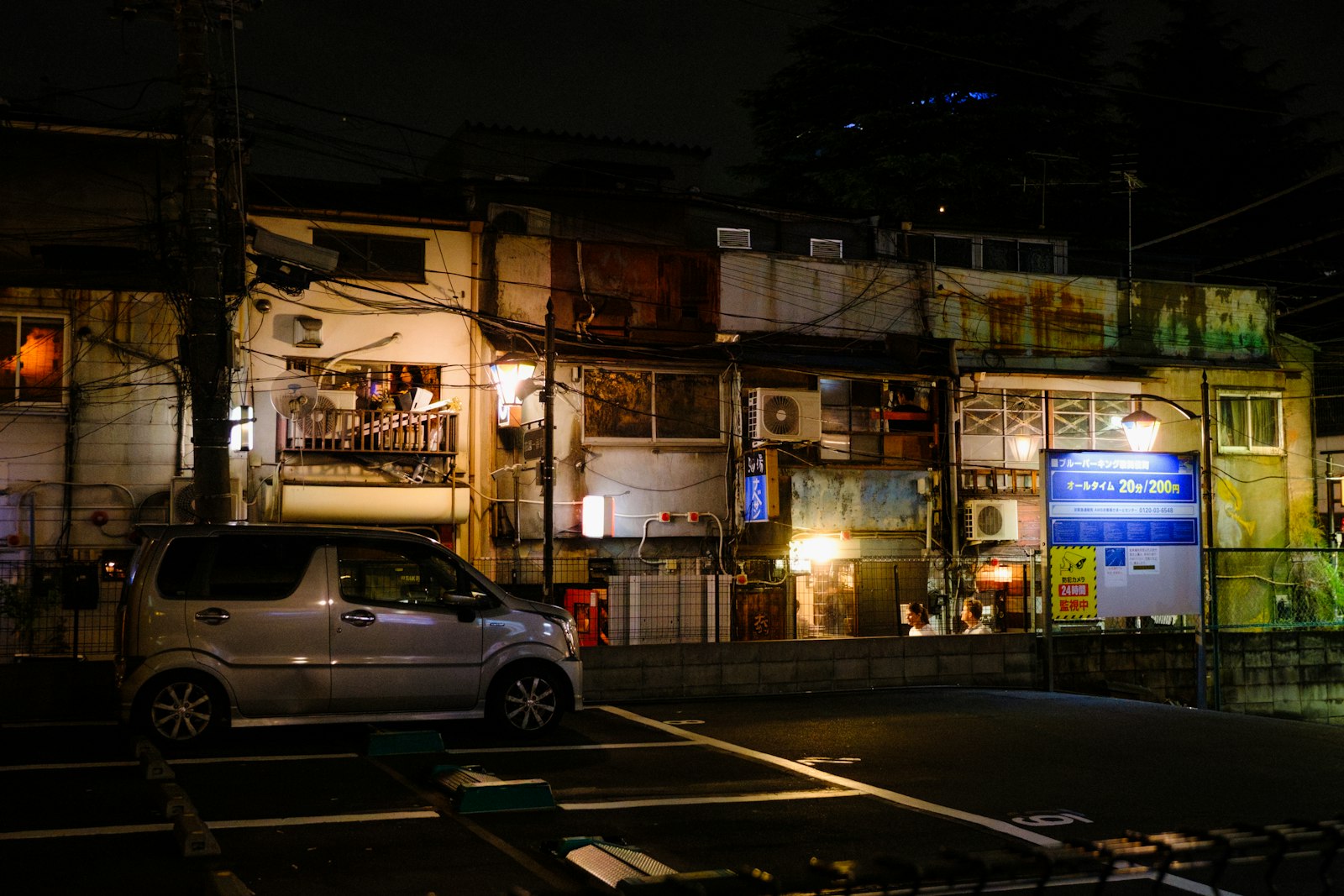 Narrow alley of small bars in Shinjuku at night, an easier alternative for first-time visitors
