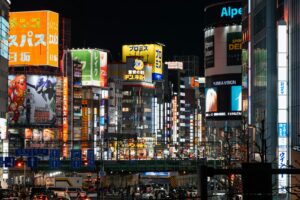 Narrow neon-lit alley of tiny bars in Shinjuku Golden Gai at night