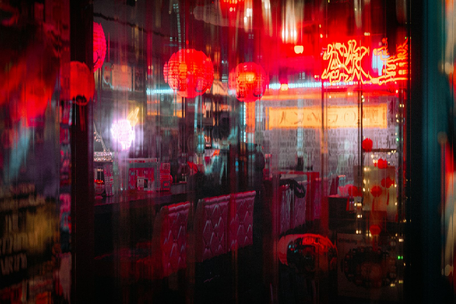 Kabukicho's main street in Shinjuku after dark, where many of Tokyo's girls bars are located