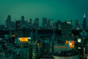 Jazz musician playing saxophone on a small stage during a jazz bar Tokyo night