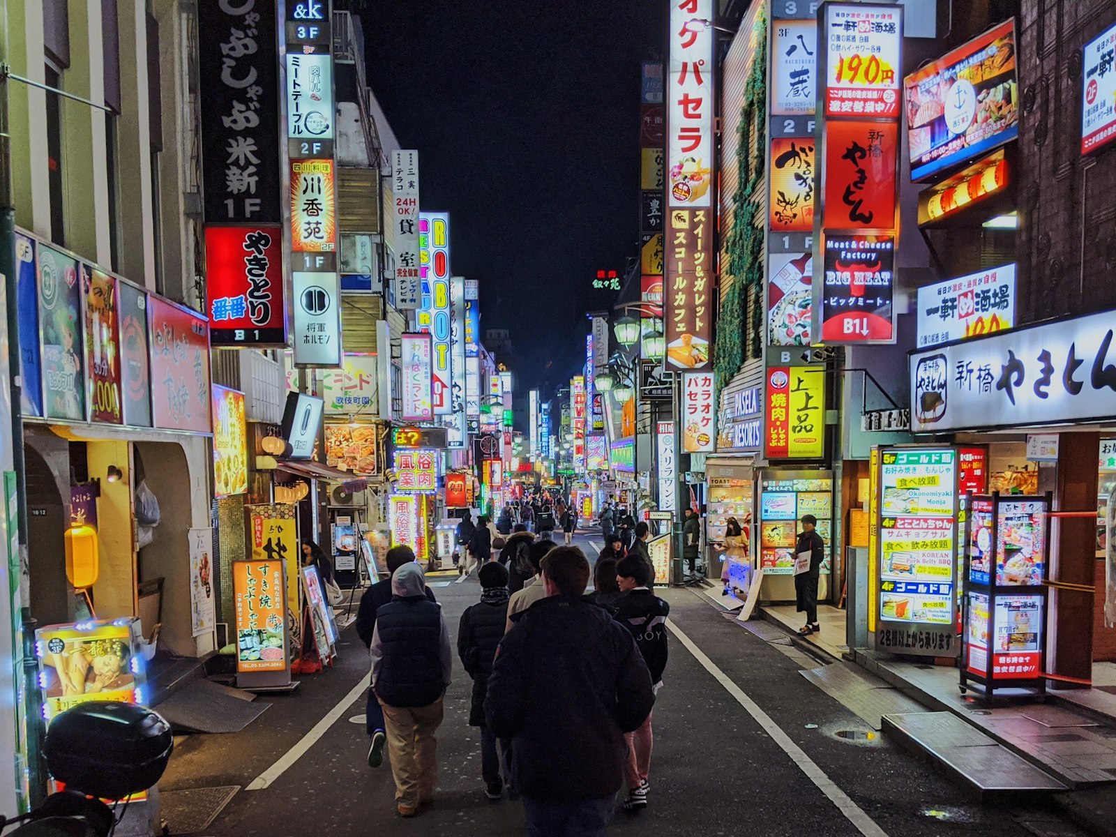 Neon-lit Kabukicho street in Shinjuku at night, home of the former Robot Restaurant