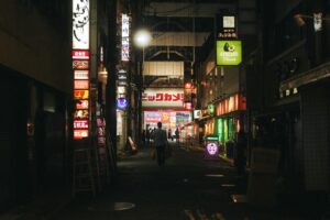 Neon signs over a Kabukicho street in Shinjuku, where the samurai restaurant is located