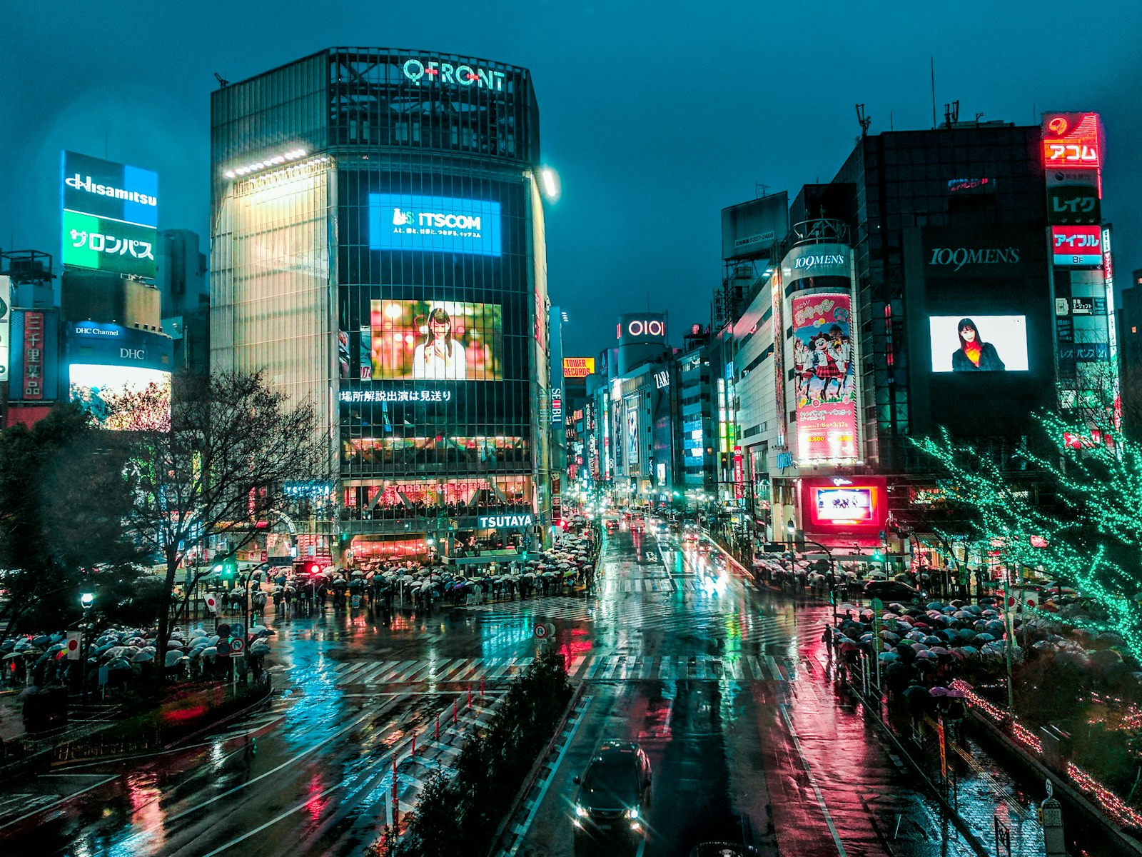 Neon signs along Dogenzaka slope in Shibuya at night, gateway to the Hyakkendana back-alley bars