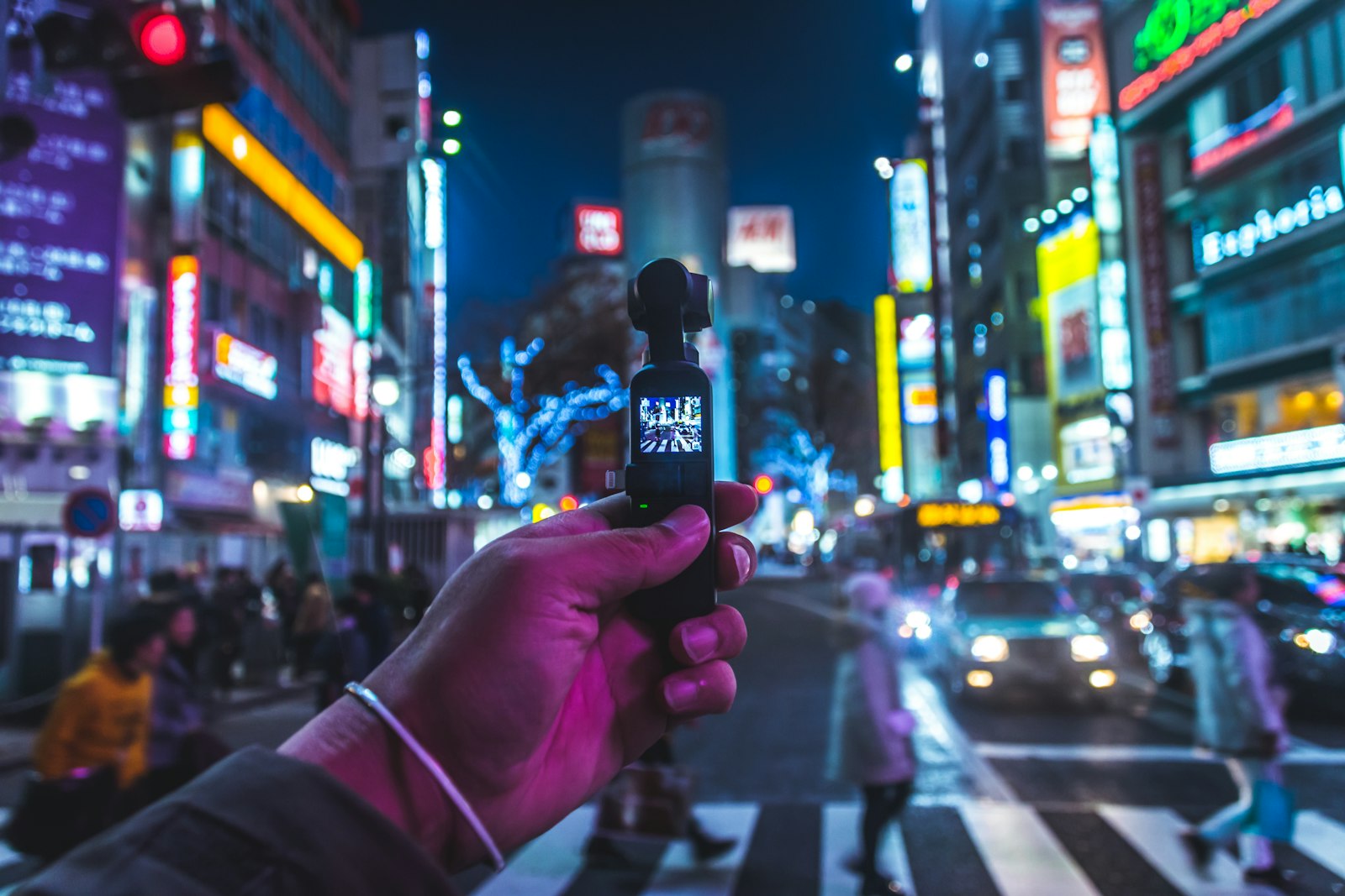 A karaoke microphone resting on a bar counter, the centrepiece of a Japanese snack bar evening