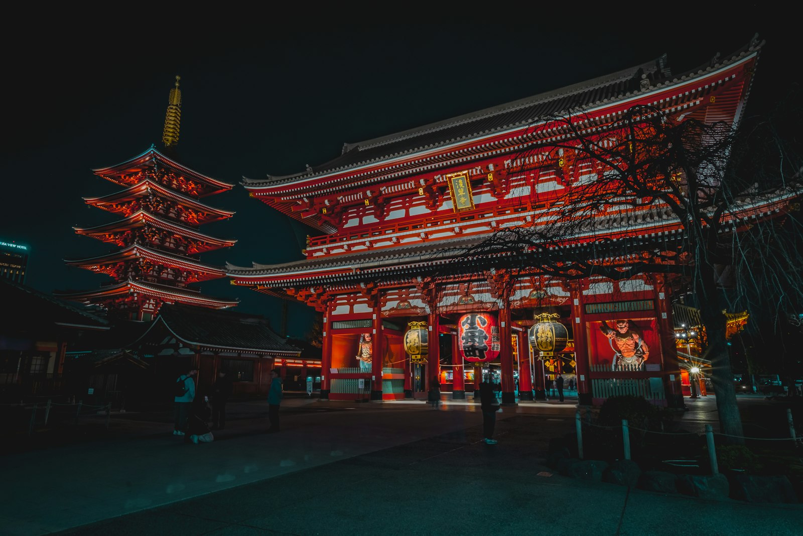Senso-ji Temple's five-story pagoda illuminated at night during Tokyo night sightseeing in Asakusa