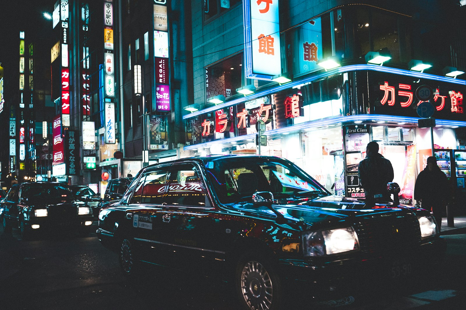 A Tokyo taxi waiting on a quiet street late at night