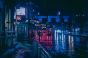 Neon-lit street in Shinjuku at night, where many Tokyo night tours and bar hopping tours begin