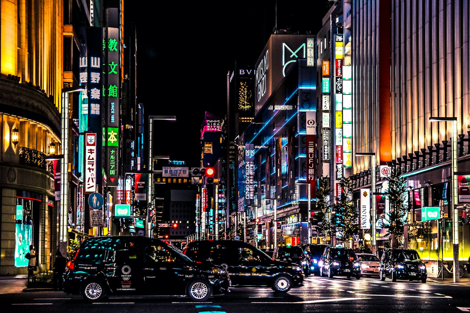 Neon-lit Shinjuku street at night, a typical stop on a Tokyo night walking tour