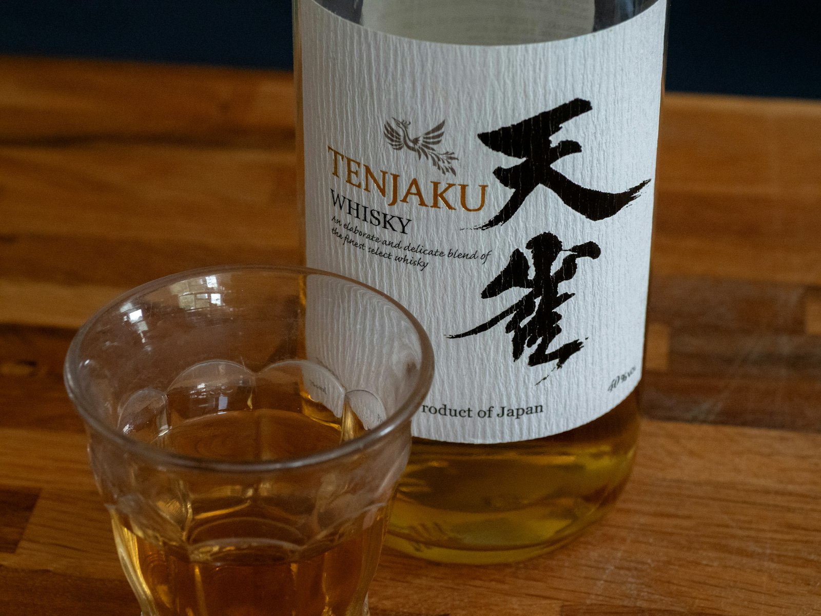 A tall Japanese whisky highball with ice and soda, a staple of Japanese whisky culture