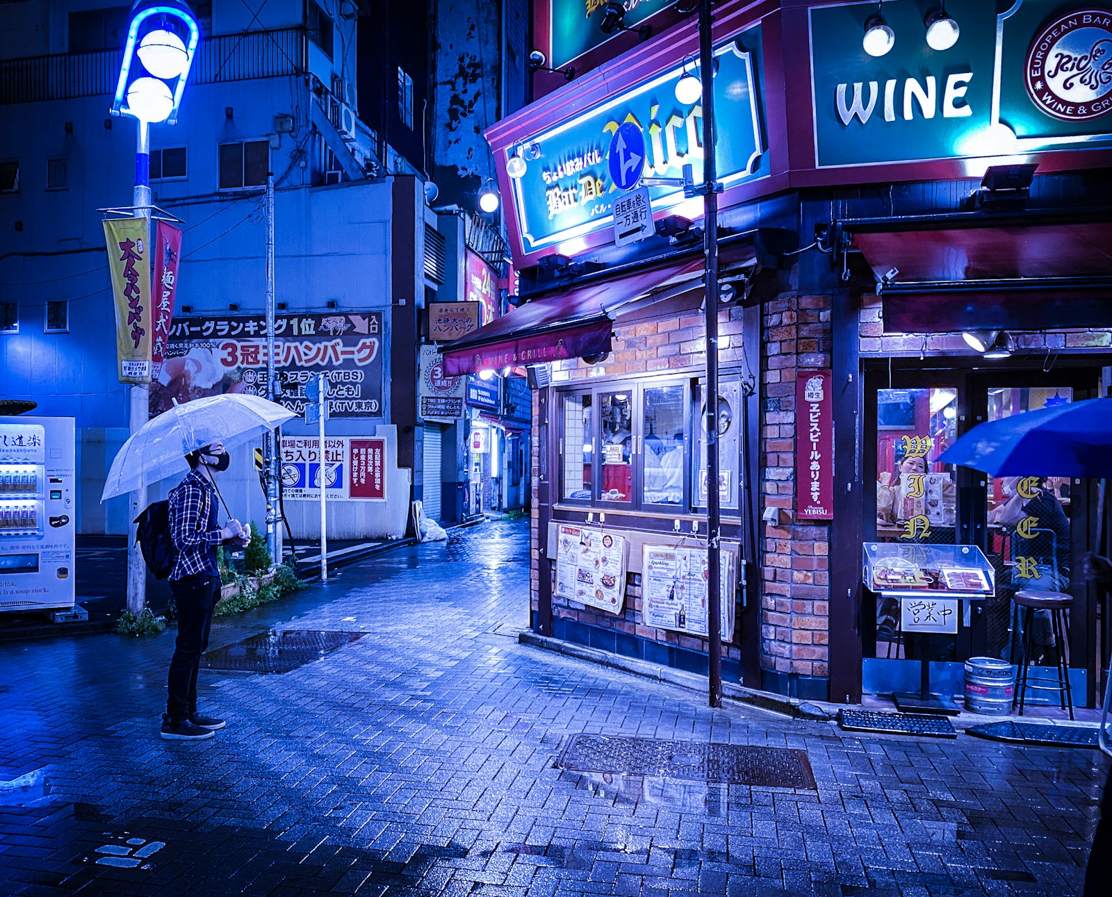 Sunshine 60 Street in Ikebukuro lit up with shop signs in the evening