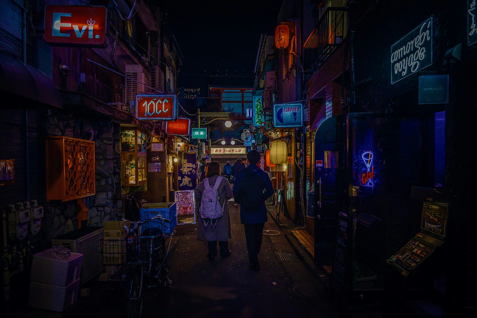 Neon signs above a Kabukicho street where many girls bars are located