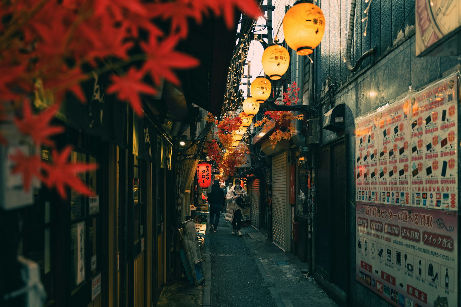 Narrow bar alley in Shinjuku Golden Gai after midnight