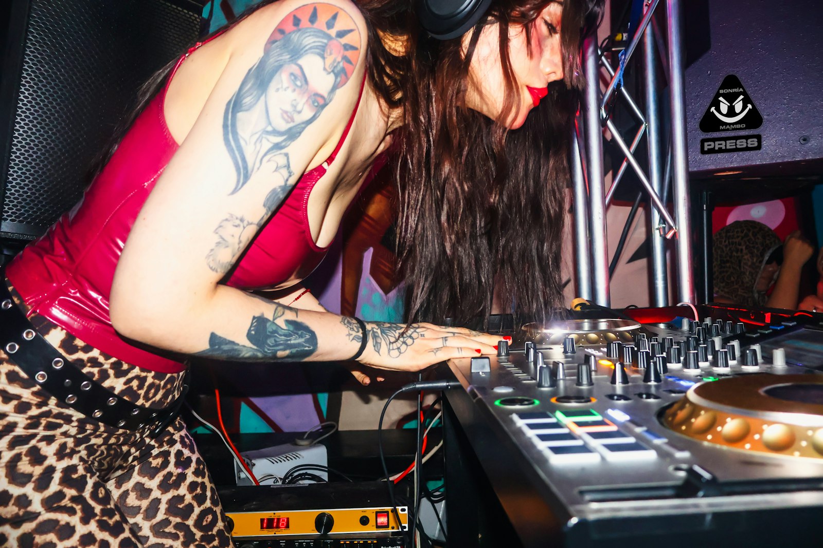 DJ playing a techno set in a small Tokyo underground club