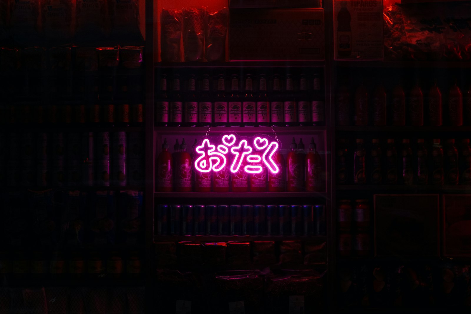 Neon signs over a Kabukicho street at night, where many Tokyo cabaret clubs are located