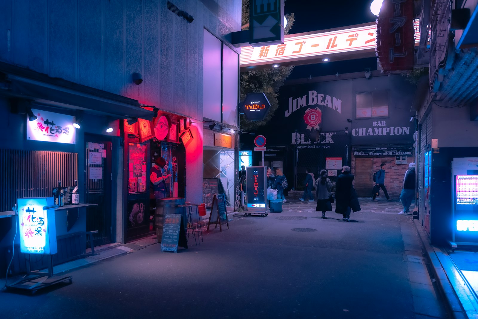 Clubbers queuing with ID at a Tokyo club entrance before a late-night DJ event