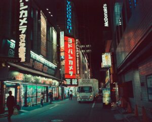 Neon signs over a Kabukicho street at night, the center of Tokyo's host club scene