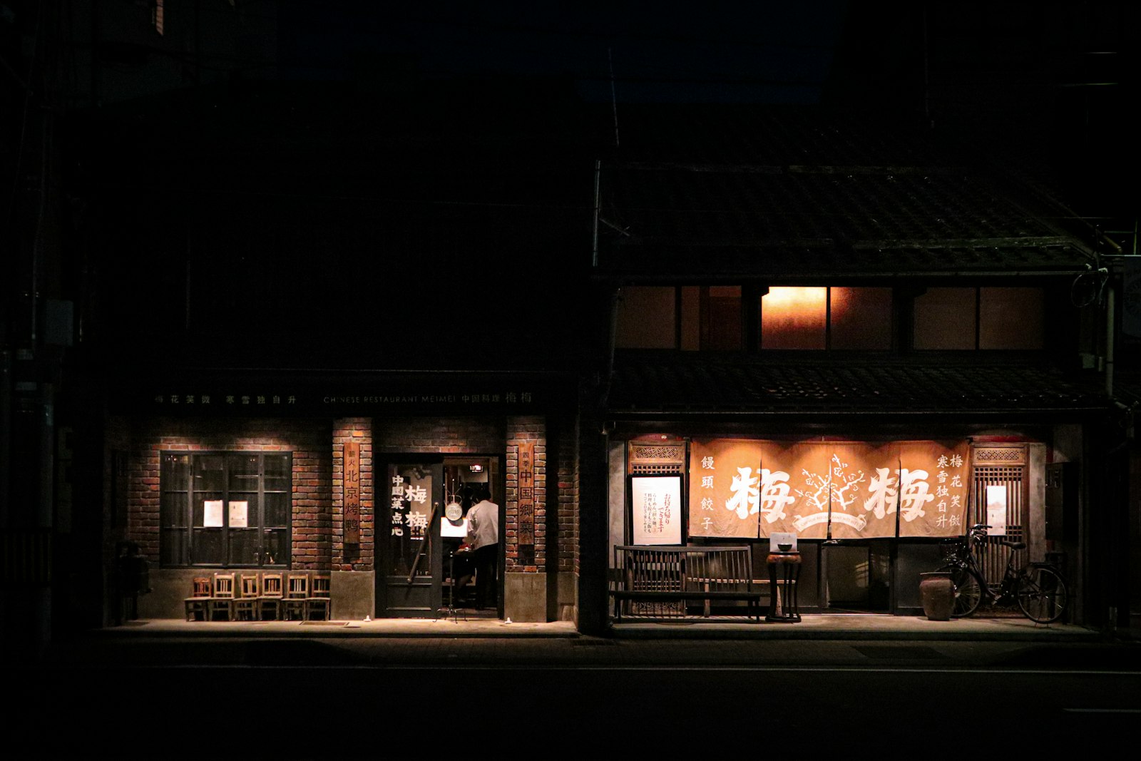 Lantern-lit izakaya alley in Shinjuku where foreign tourists and locals drink side by side