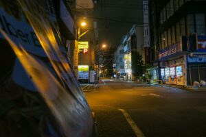 Neon signs above Akihabara's main street, the heart of Tokyo maid cafe culture