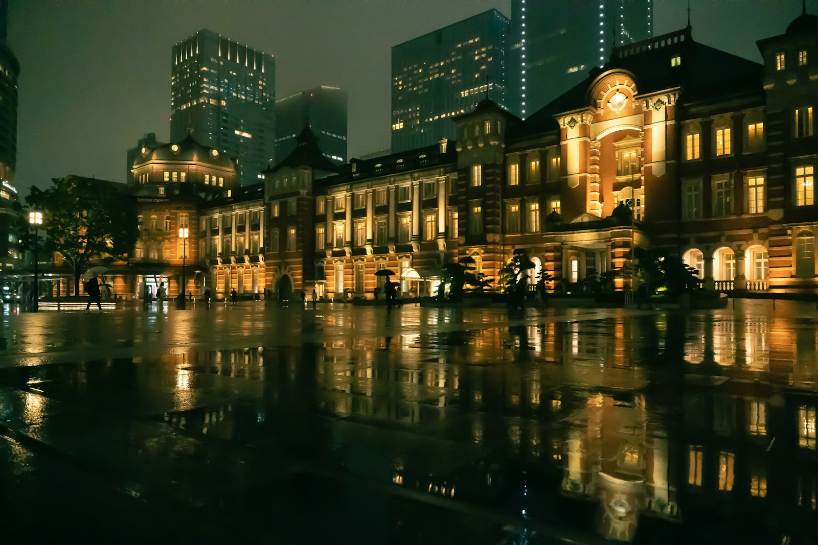 Tokyo train station gates closing late at night after the last train has left